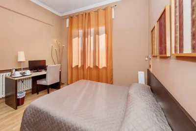 Habitación Cuádruple — Lucca In Villa Elisa & Gentucca